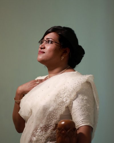 Adorable bride in white saree - feathertouch beauty salon, pathanamthitta