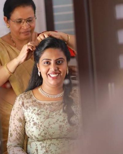 Lovely girl in an engagement makeup session  - feathertouch beauty salon, pathanamthitta